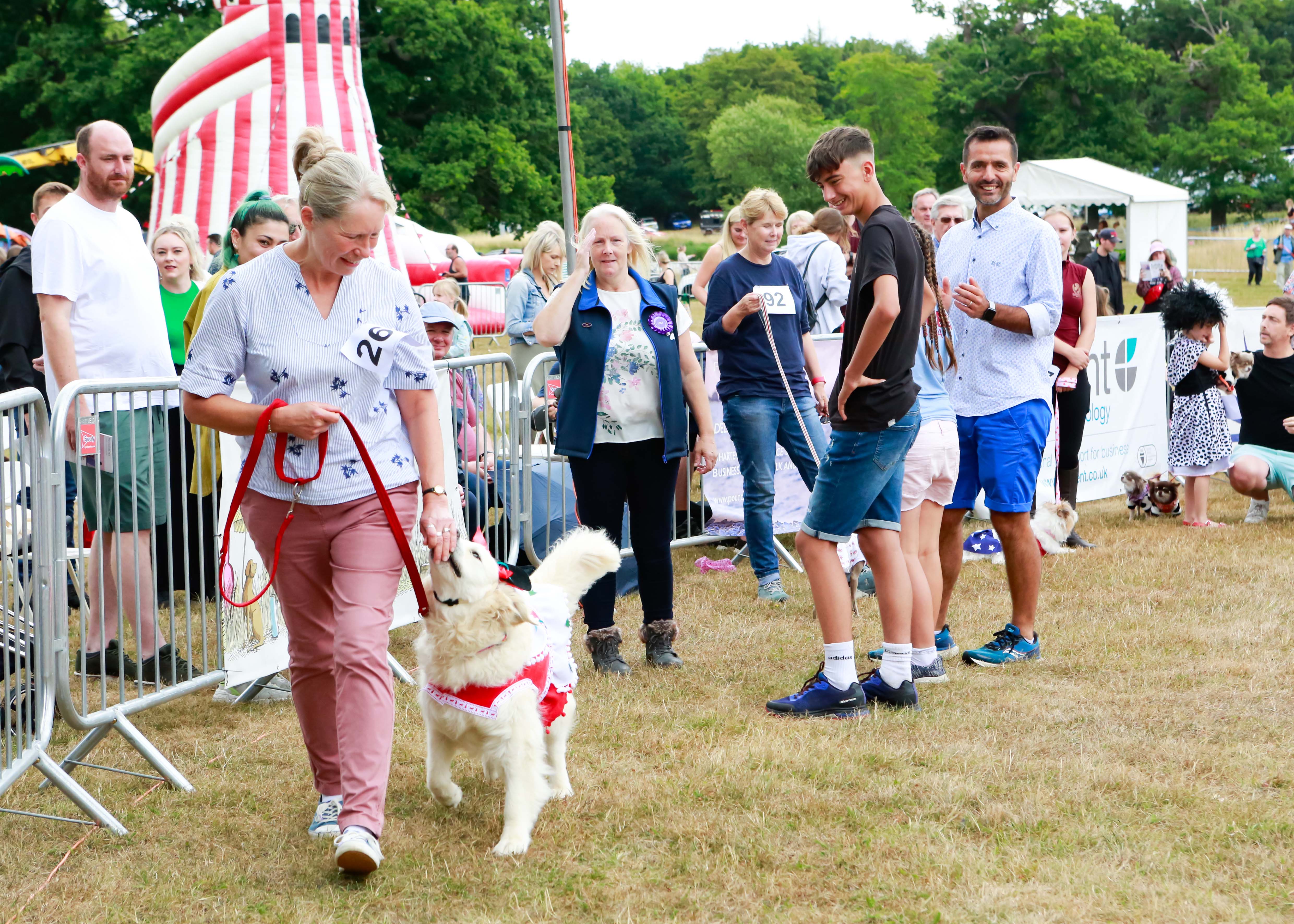 Lady and her dog participating in Suffolk Dog Day