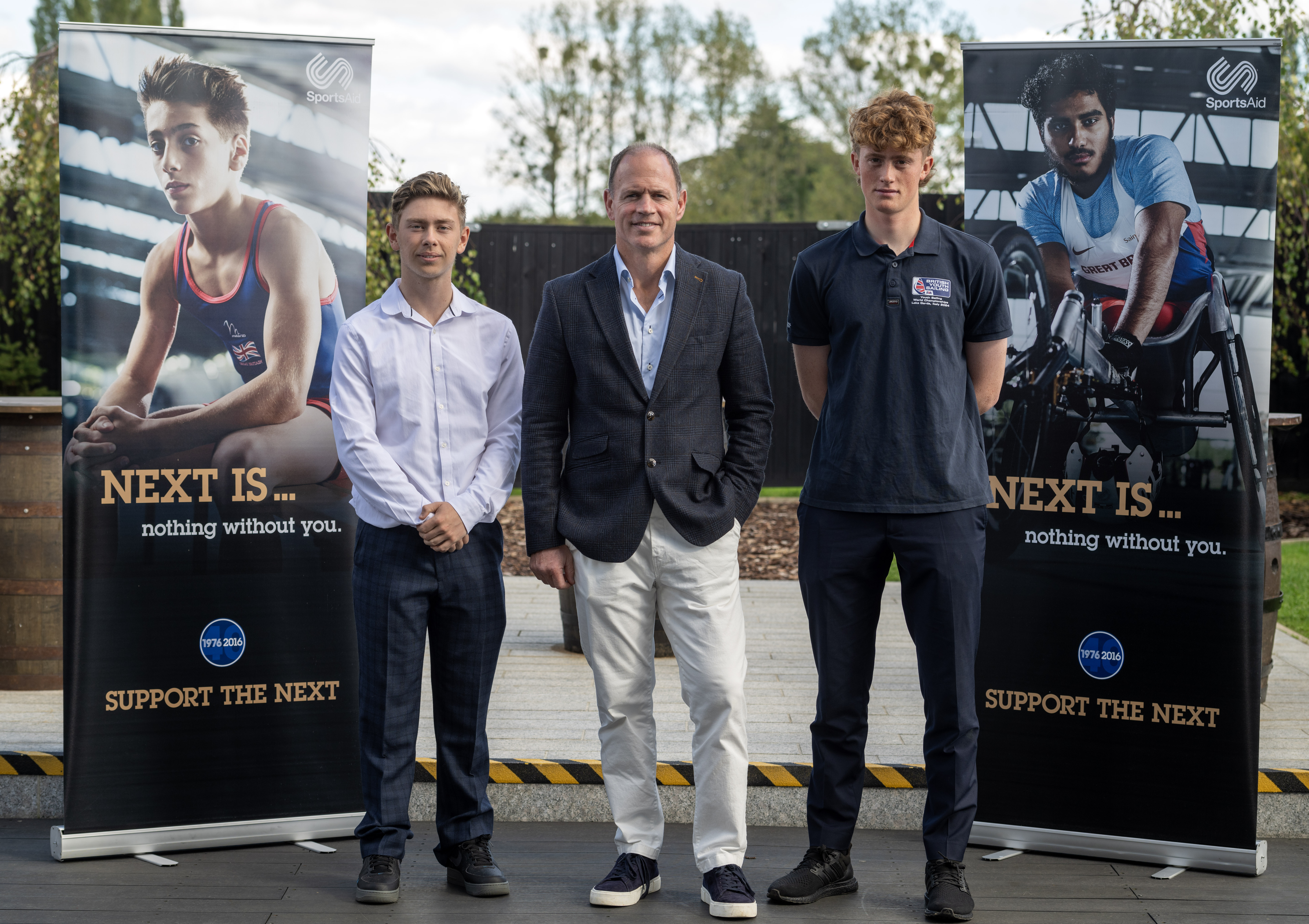 Kyran Bracken MBE pictured with grant recipients Hamish Collingridge (right), and Charlie Beeton (left)