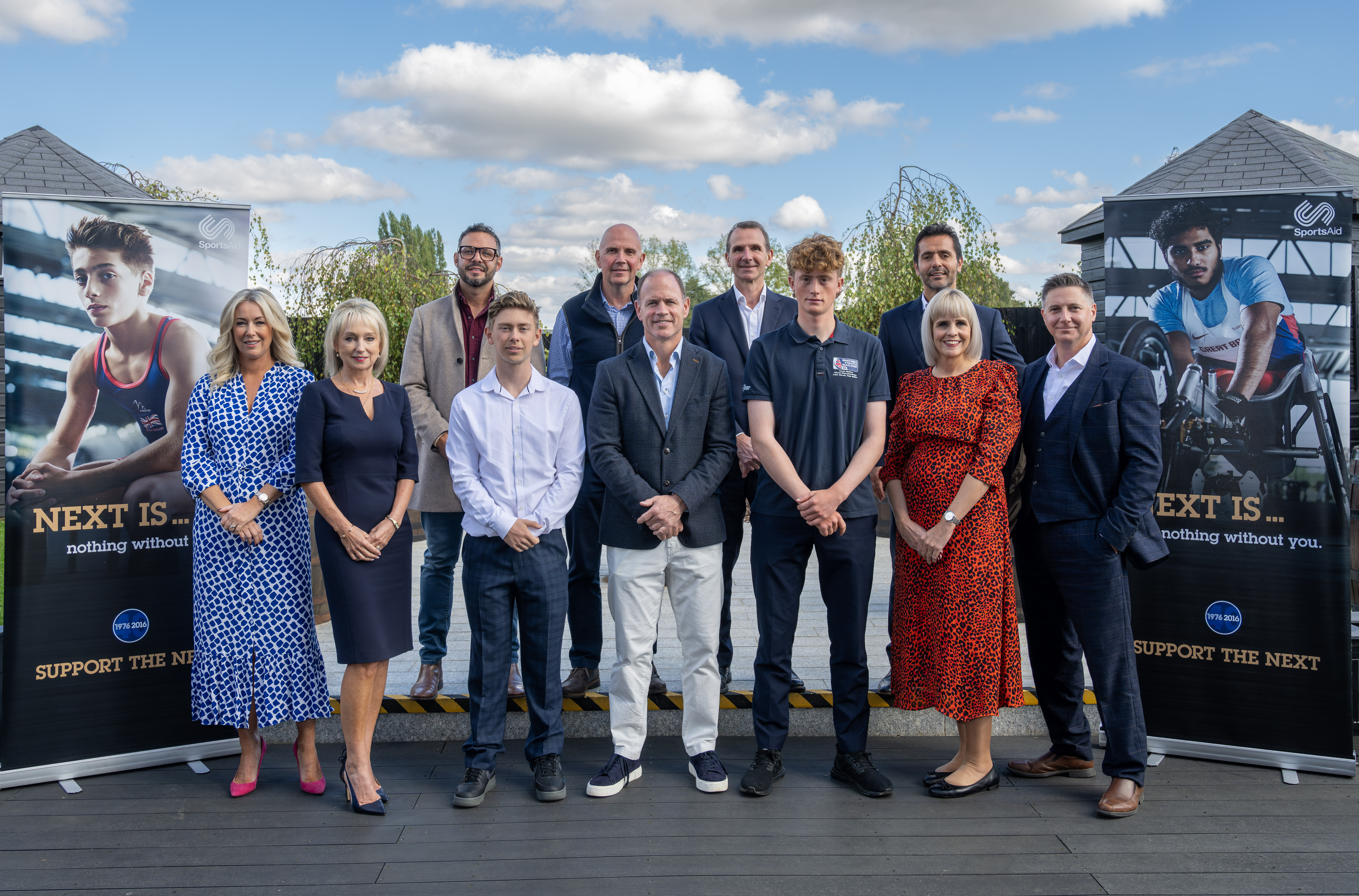 Kyran Bracken MBE with grant recipients Hamish Collingridge and Charlie Beeton, and representatives of the Ipswich Sporting Lunch Club sponsors