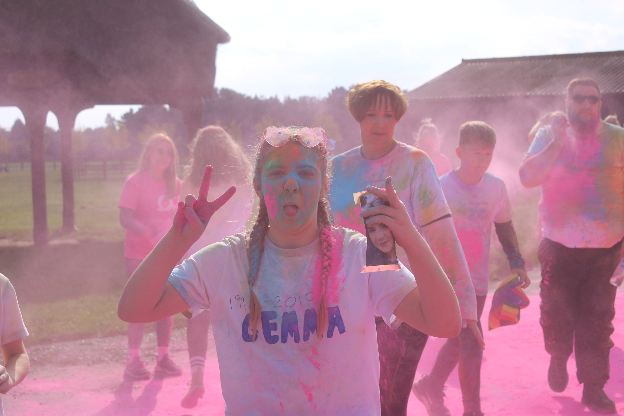 Runners covered in coloured powder