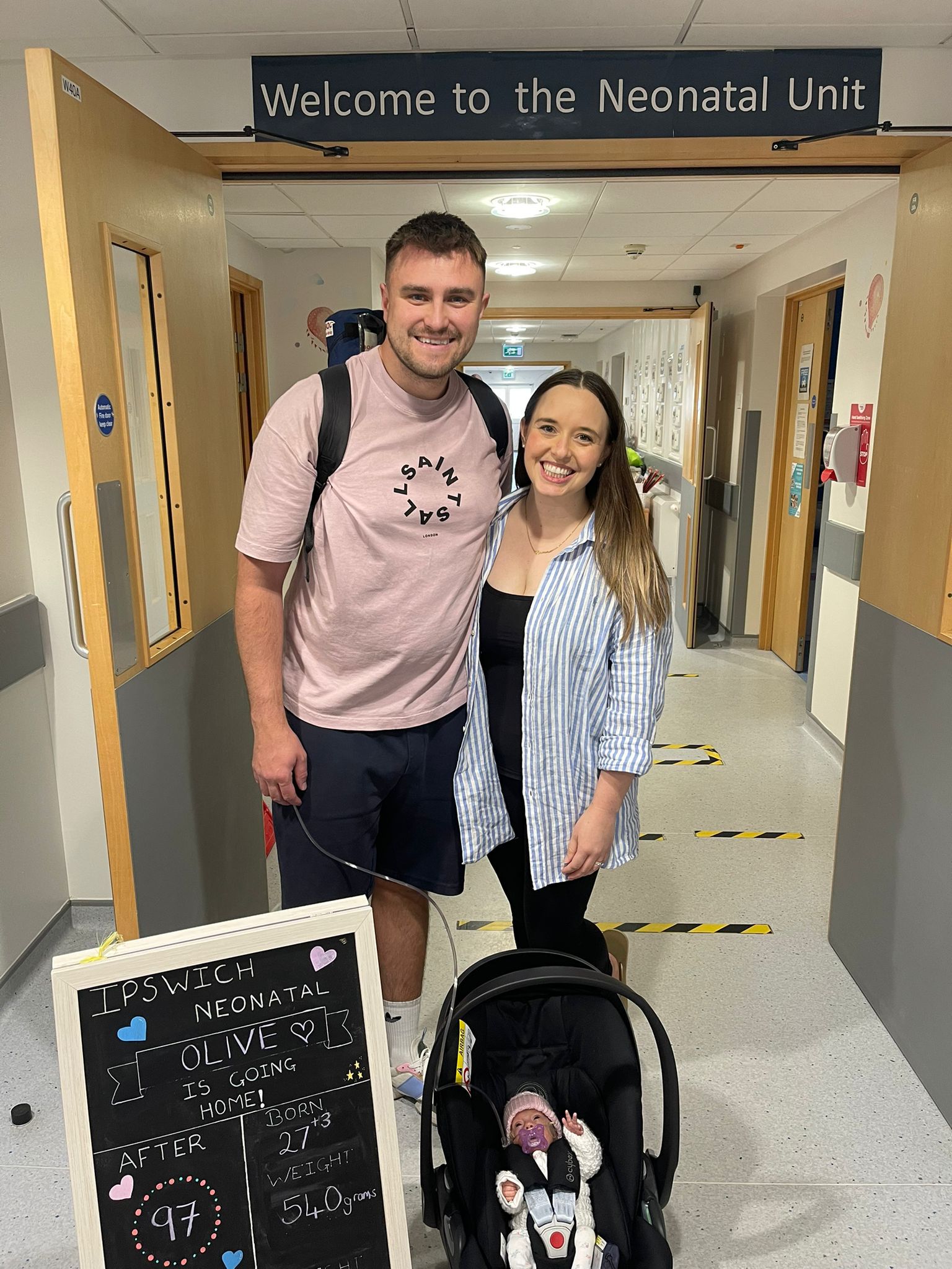 Olive and her parents on their way home