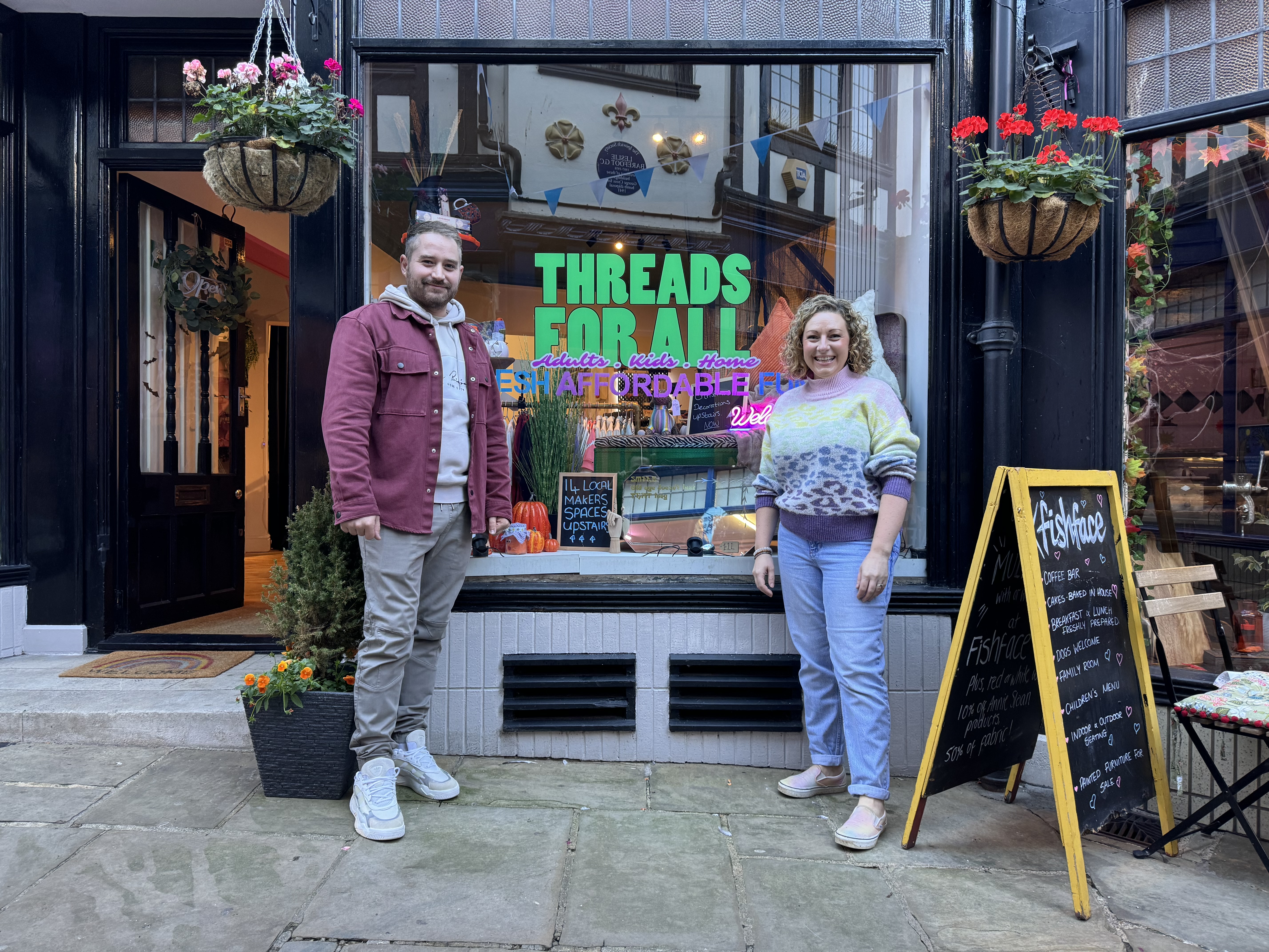Founders Will and Jenny outside Threads for All in Ipswich