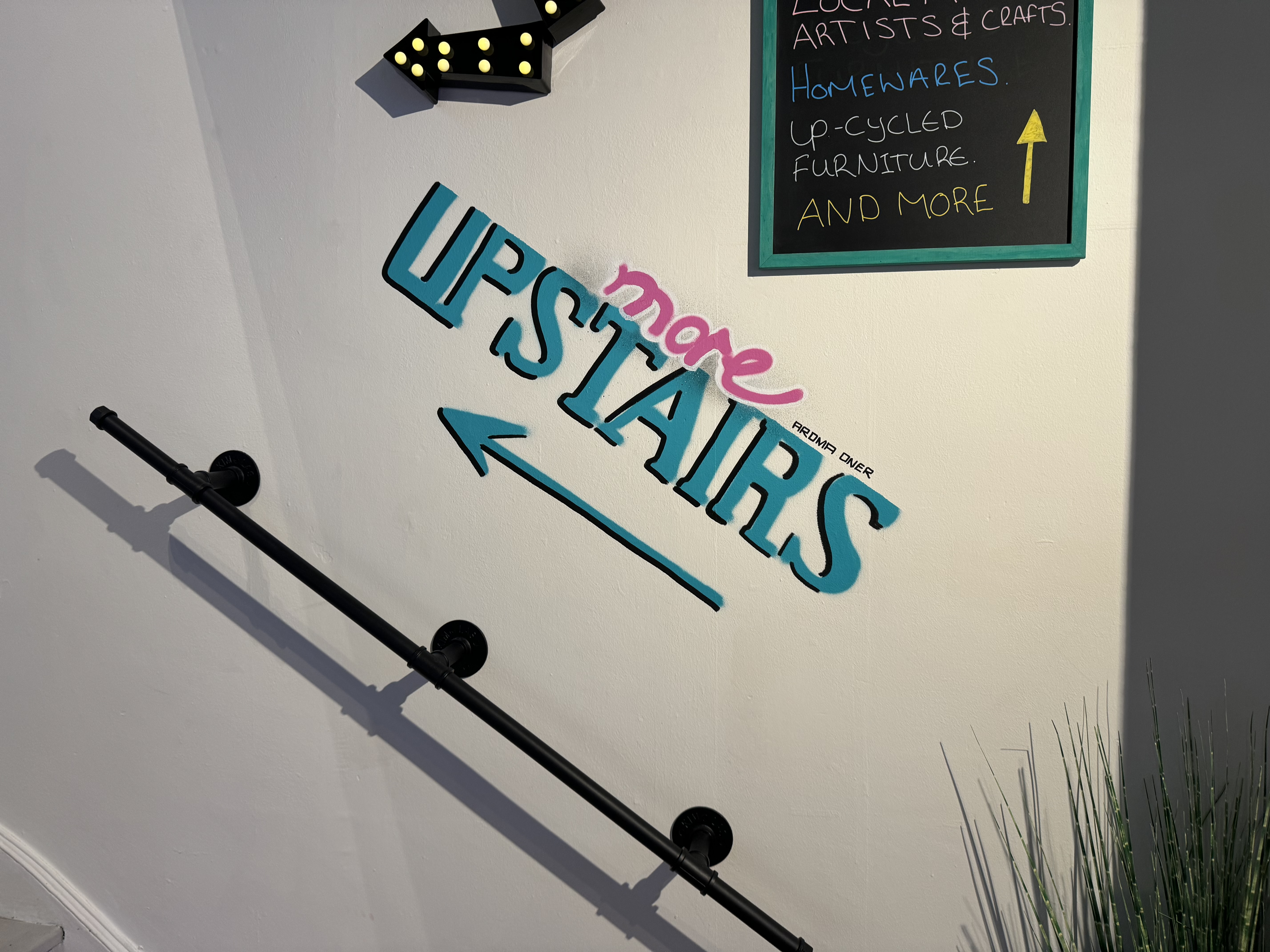 "More upstairs" sign in Threads for All in Ipswich
