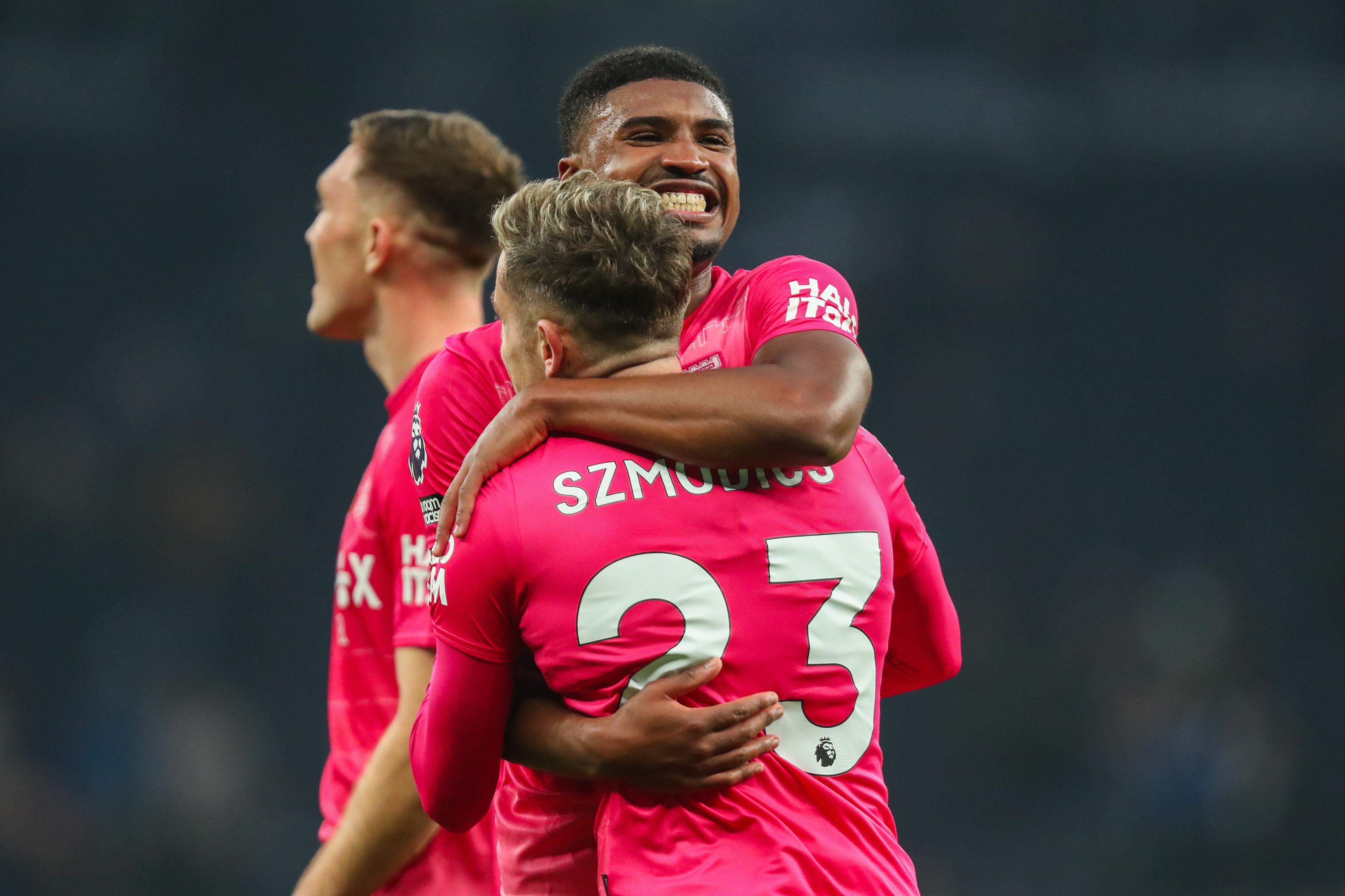 Johnson celebrates with Szmodics, who scored a brilliant overhead kick to make it 1-0 Town