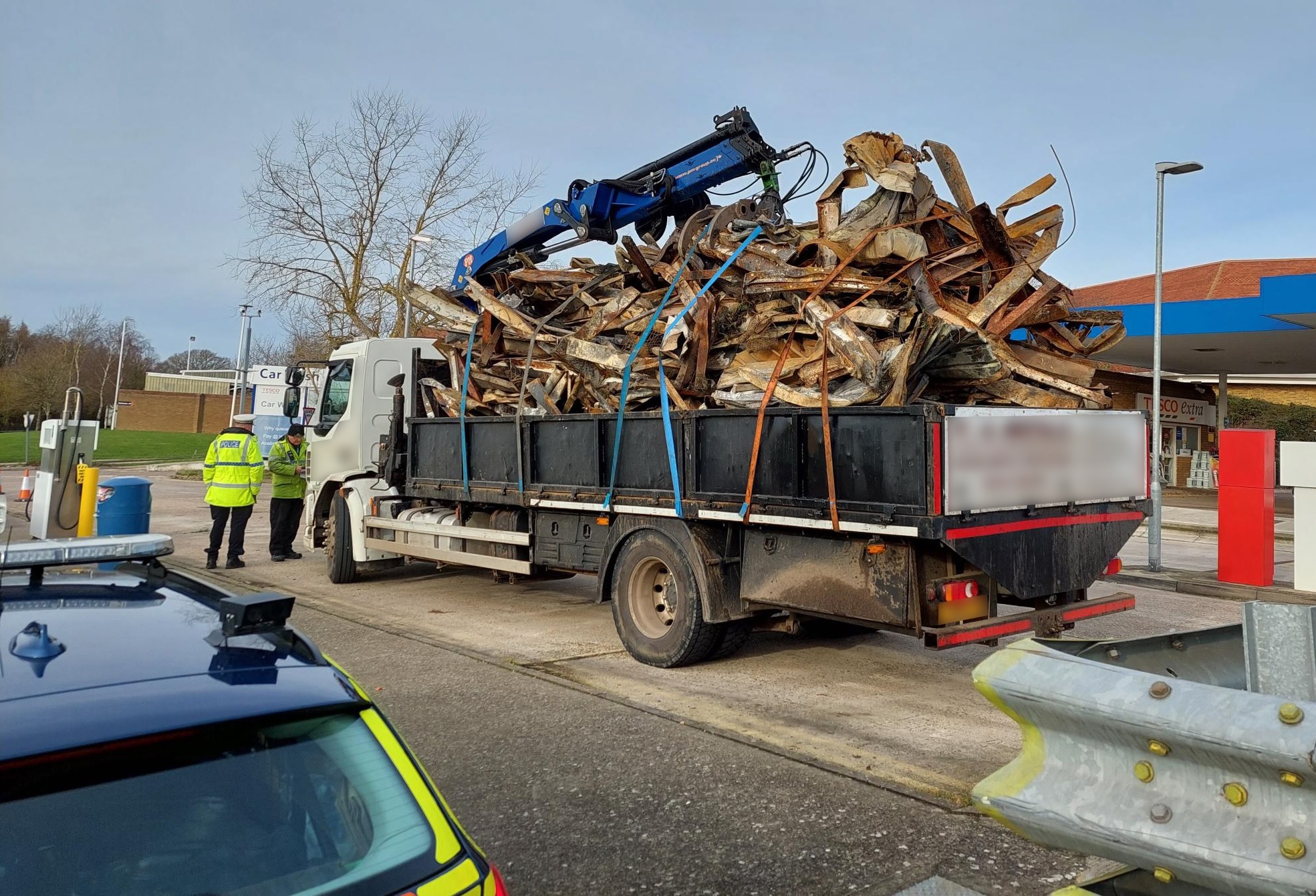 A truck pulled over for its inadequately secured load