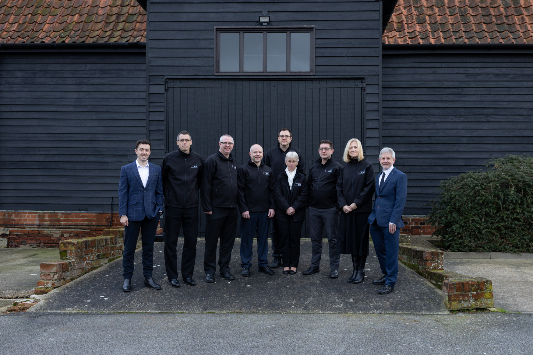 The ICS team outside their offices in Henley, just outside Ipswich