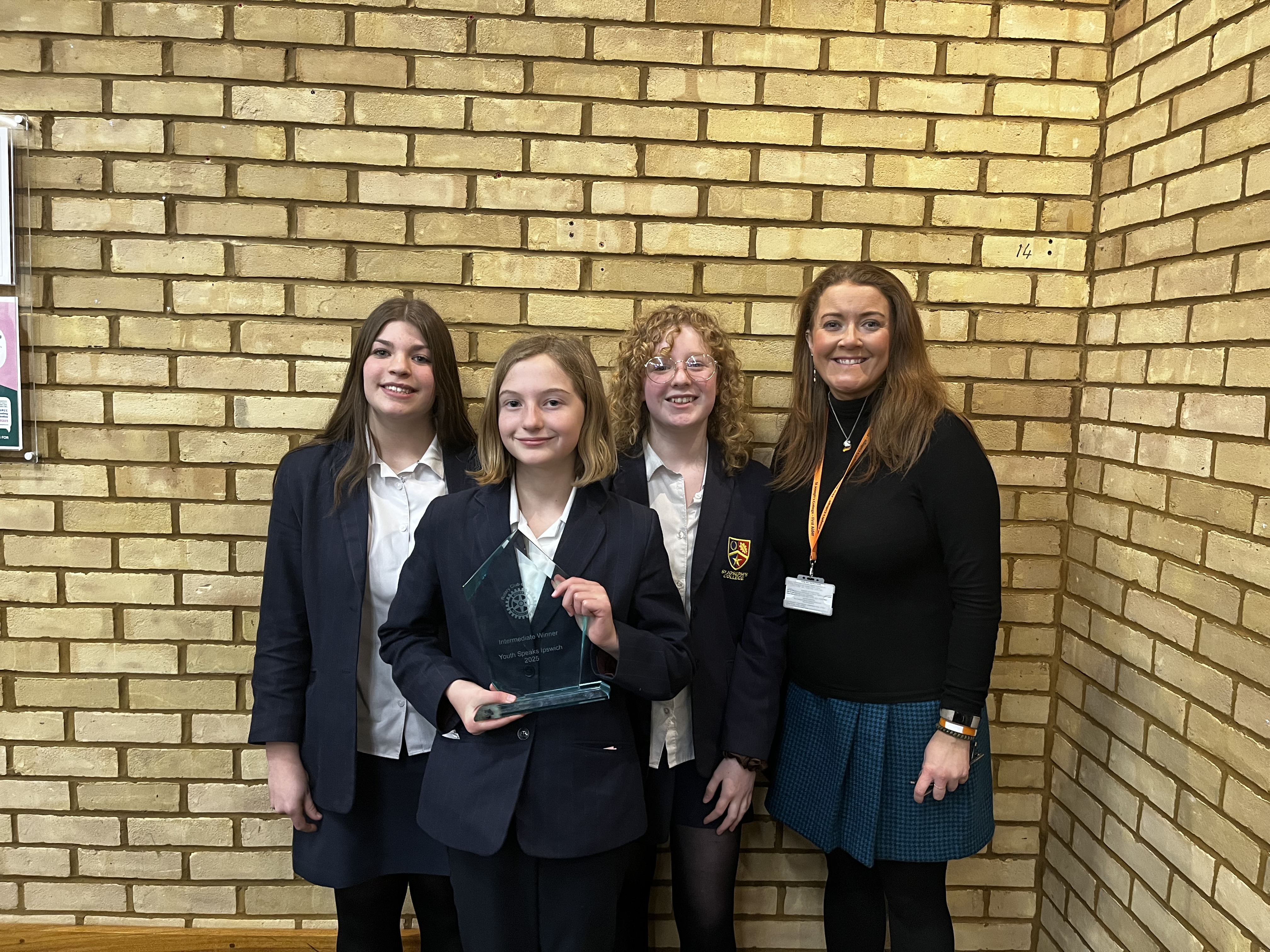 The intermediate team of Megan (Captain), Clara (Proposition) and Holly (Opposition) debated whether artificial intelligence helps or hinders human society