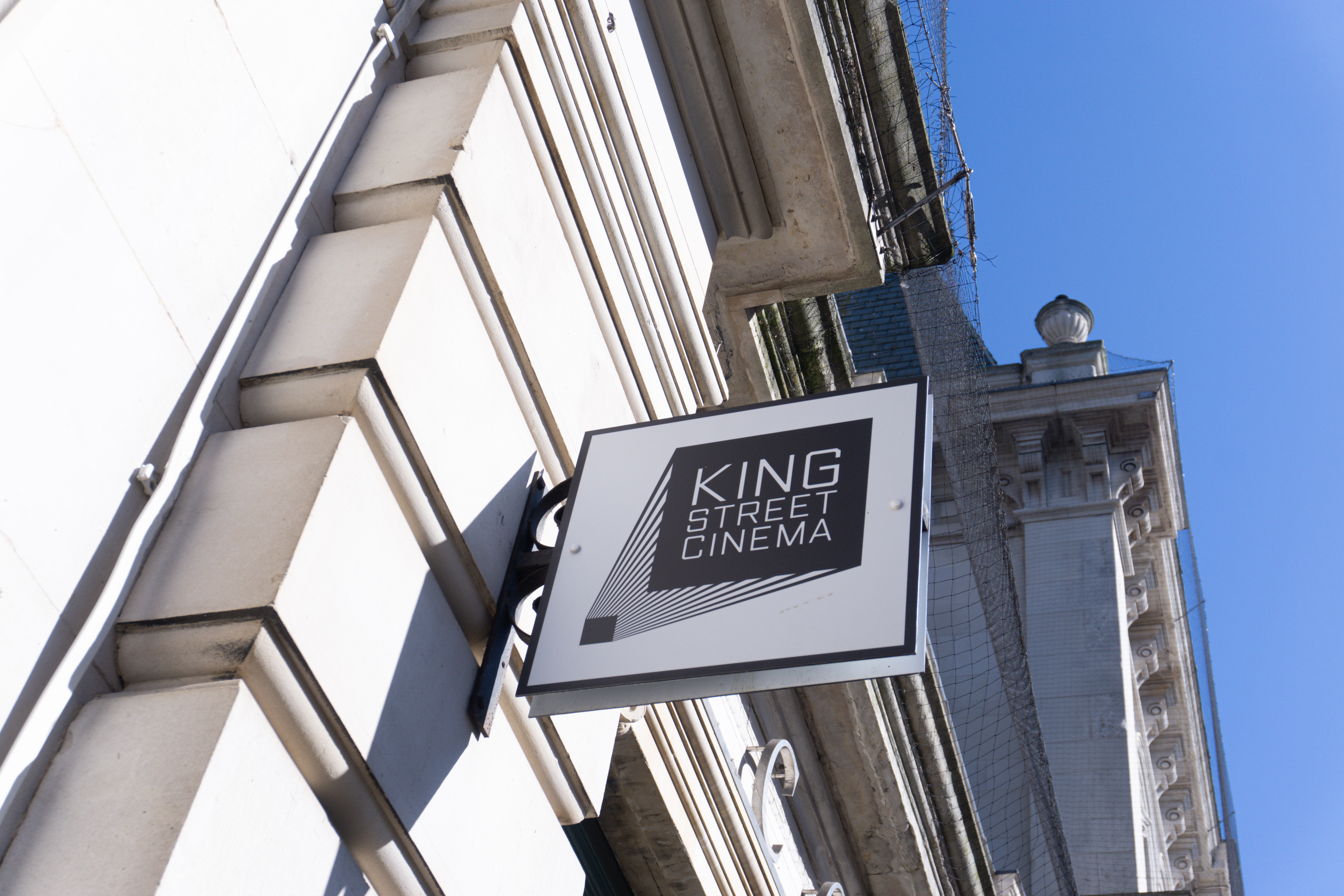 King Street Cinema sign hanging outside the building