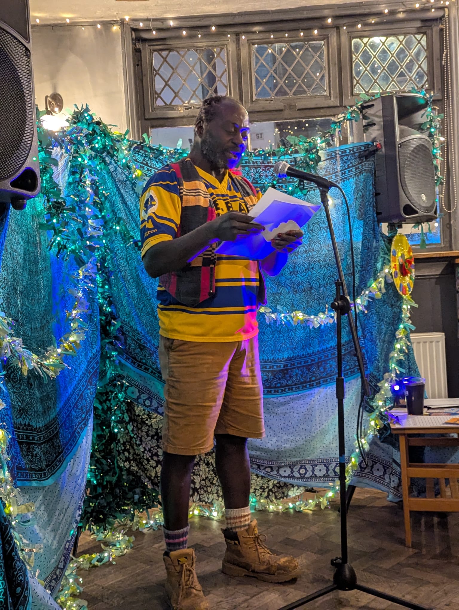 Poet performing at Words & Verses, at The Spread Eagle