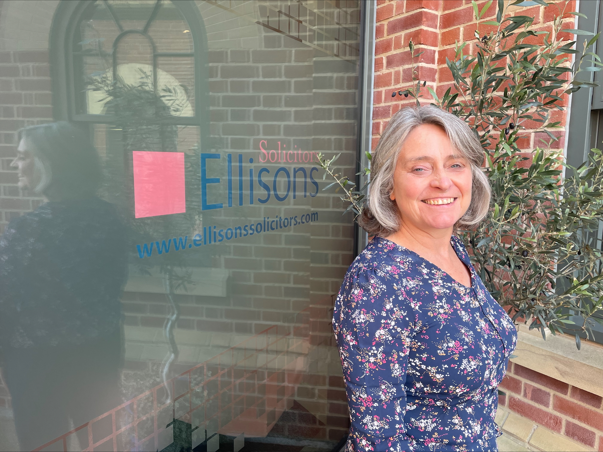Sally Ward standing outside the Ellisons office
