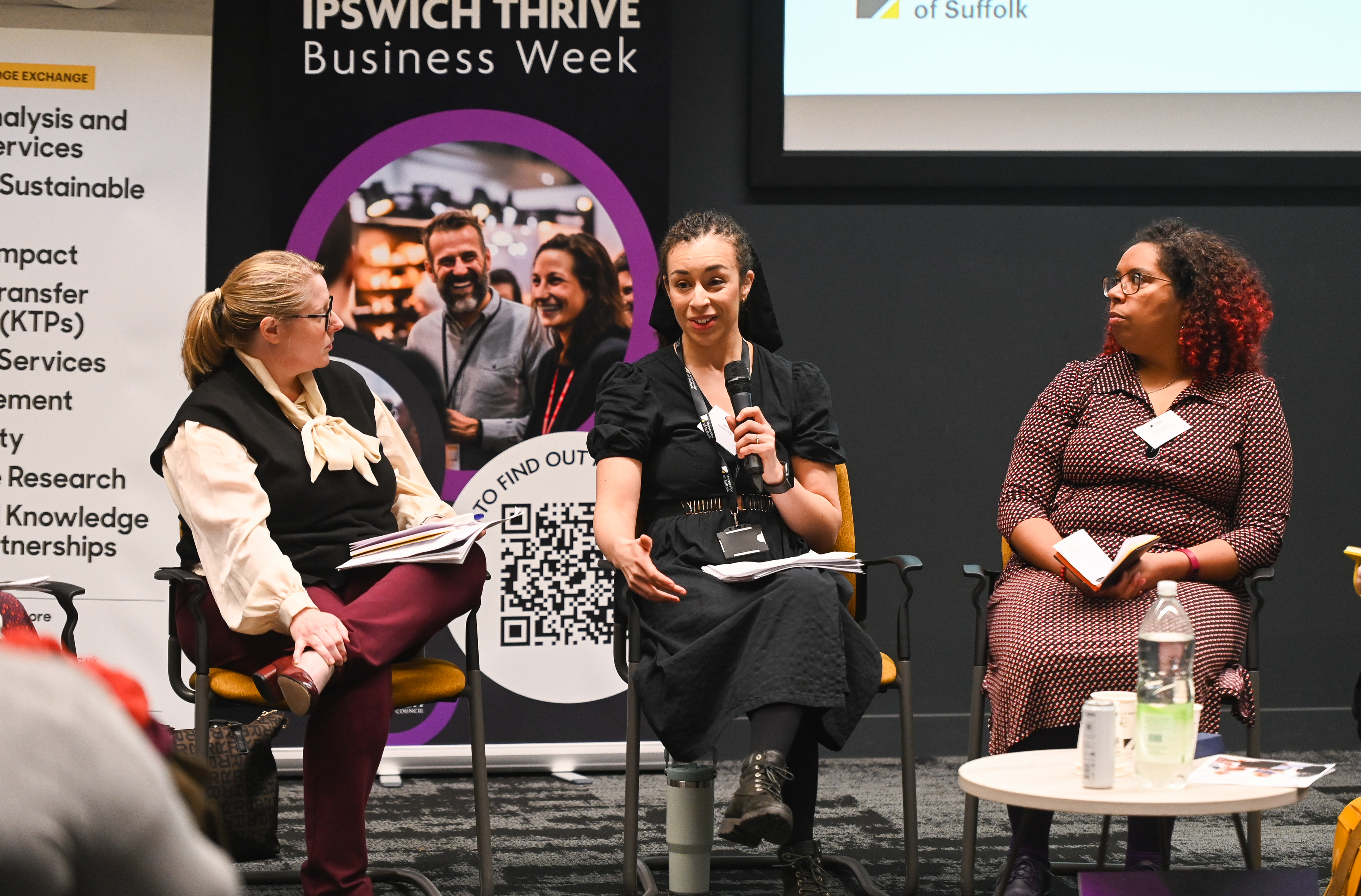 Three speakers talking on stage at Suffolk Unlocked on March 13th 2025