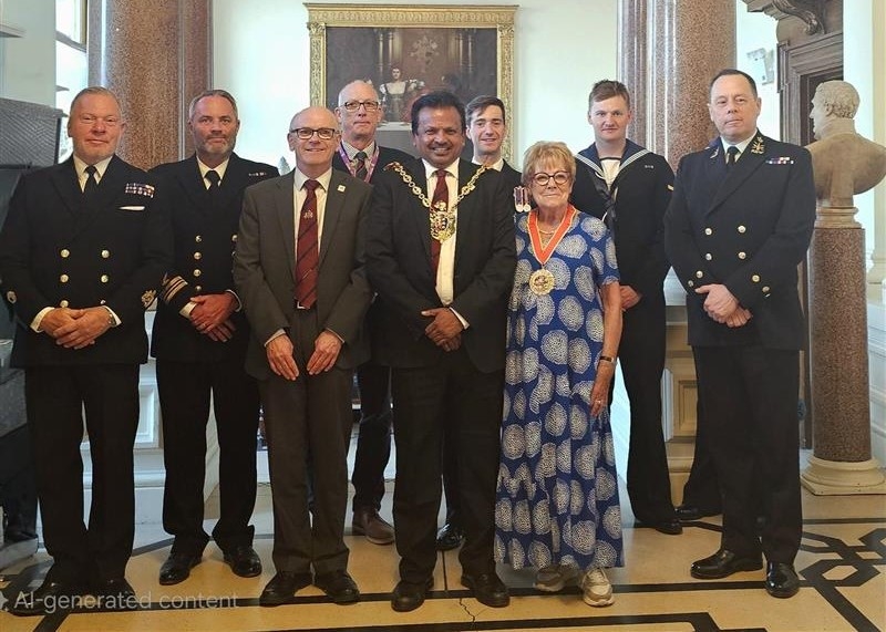 Councillors and crew members at Ipswich Town Hall