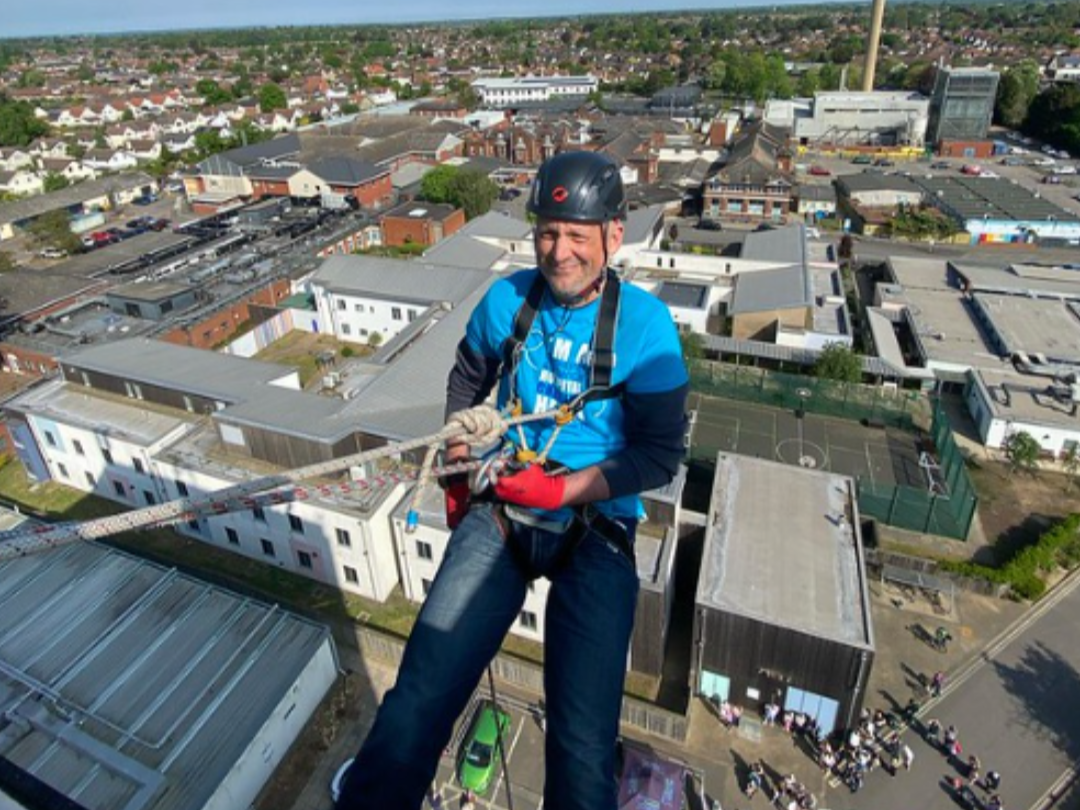 Joe Alexander at the start of his abseil