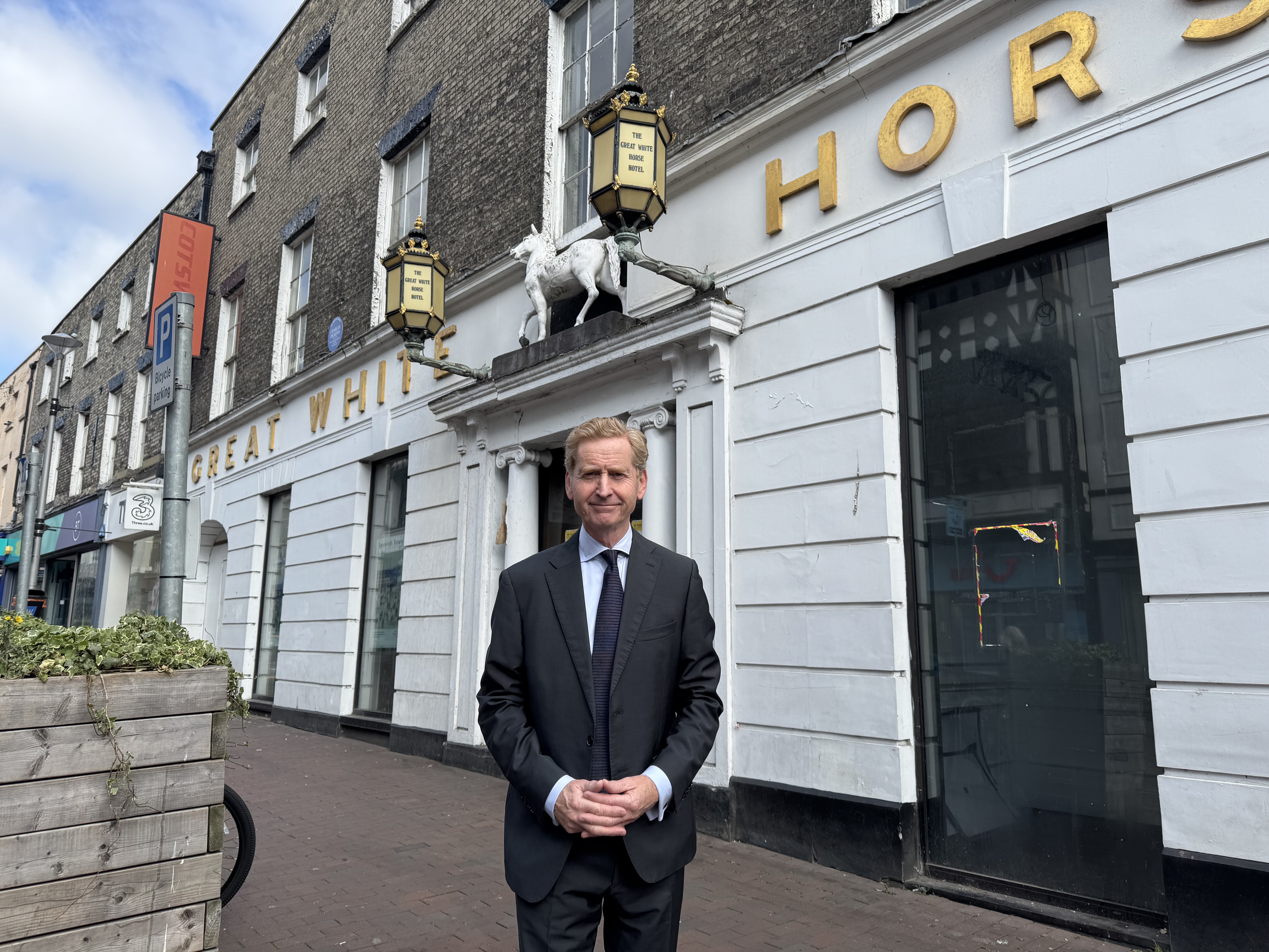 John Howard outside the Great White Horse Hotel in Ipswich