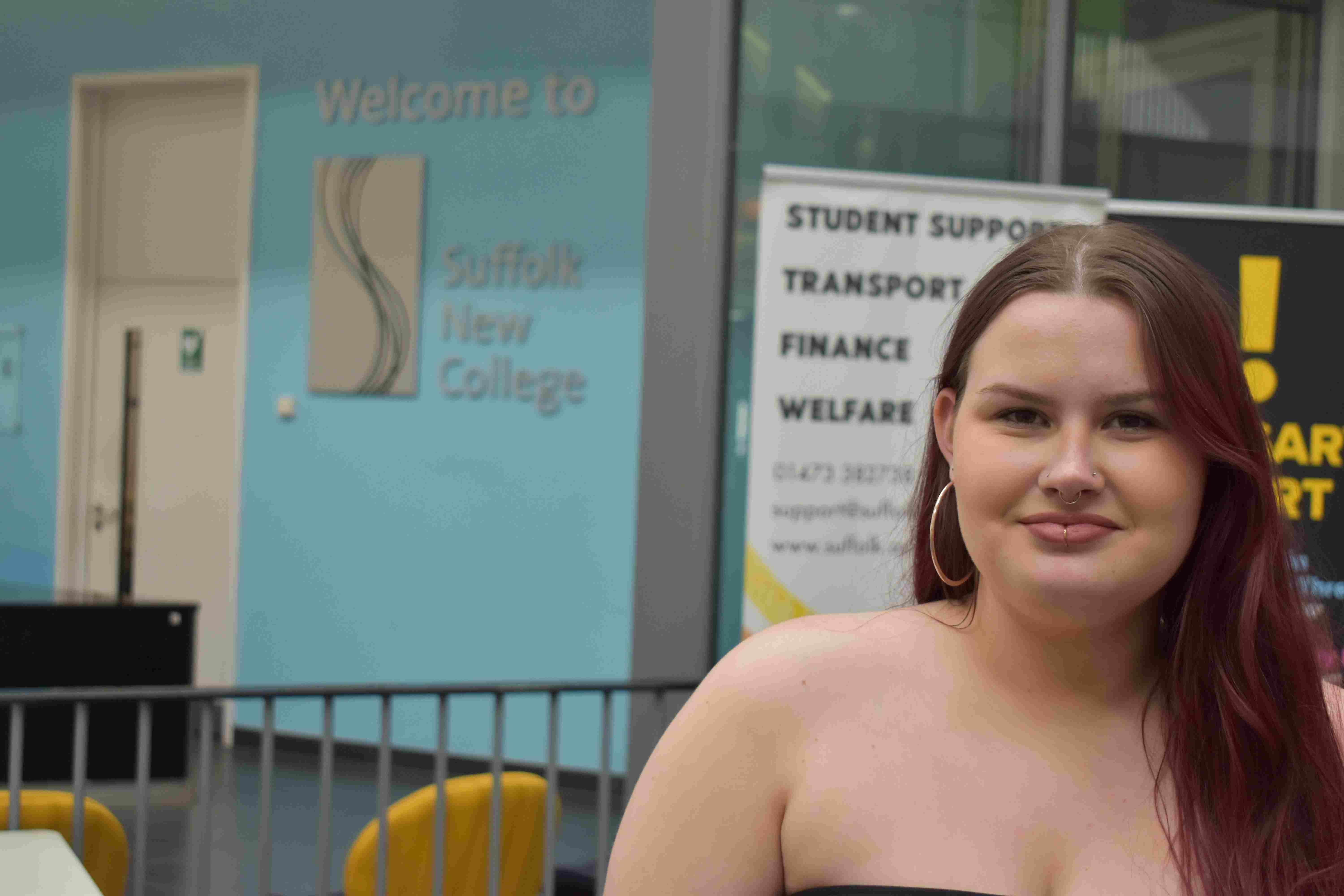 Bailey Whiting smiling outside Suffolk New College