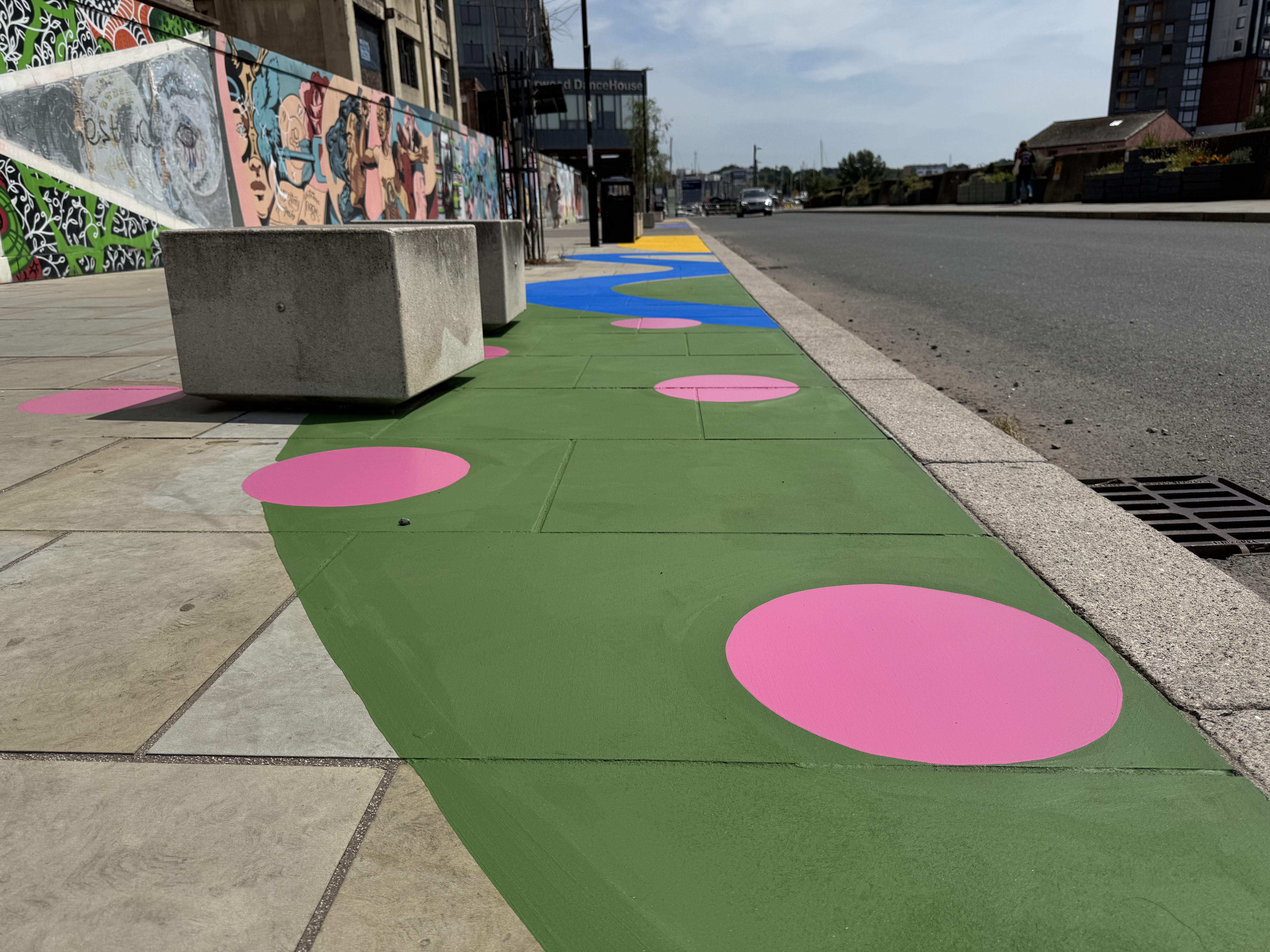 Art lines the pavement along St Peter's Dock in Ipswich