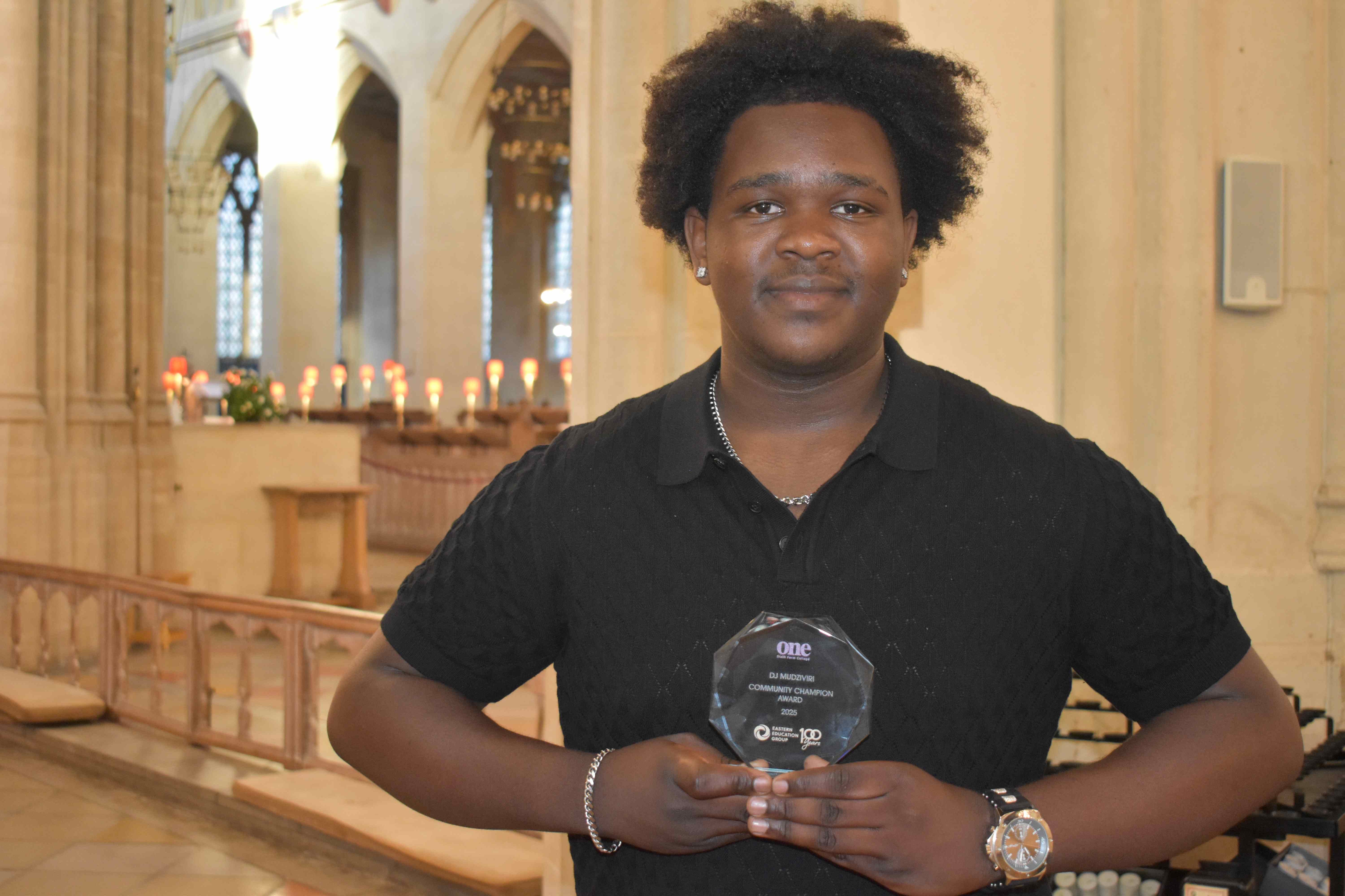 DJ Mudziviri received a community champion trophy from Eastern Education Group for setting up Better Youth UK