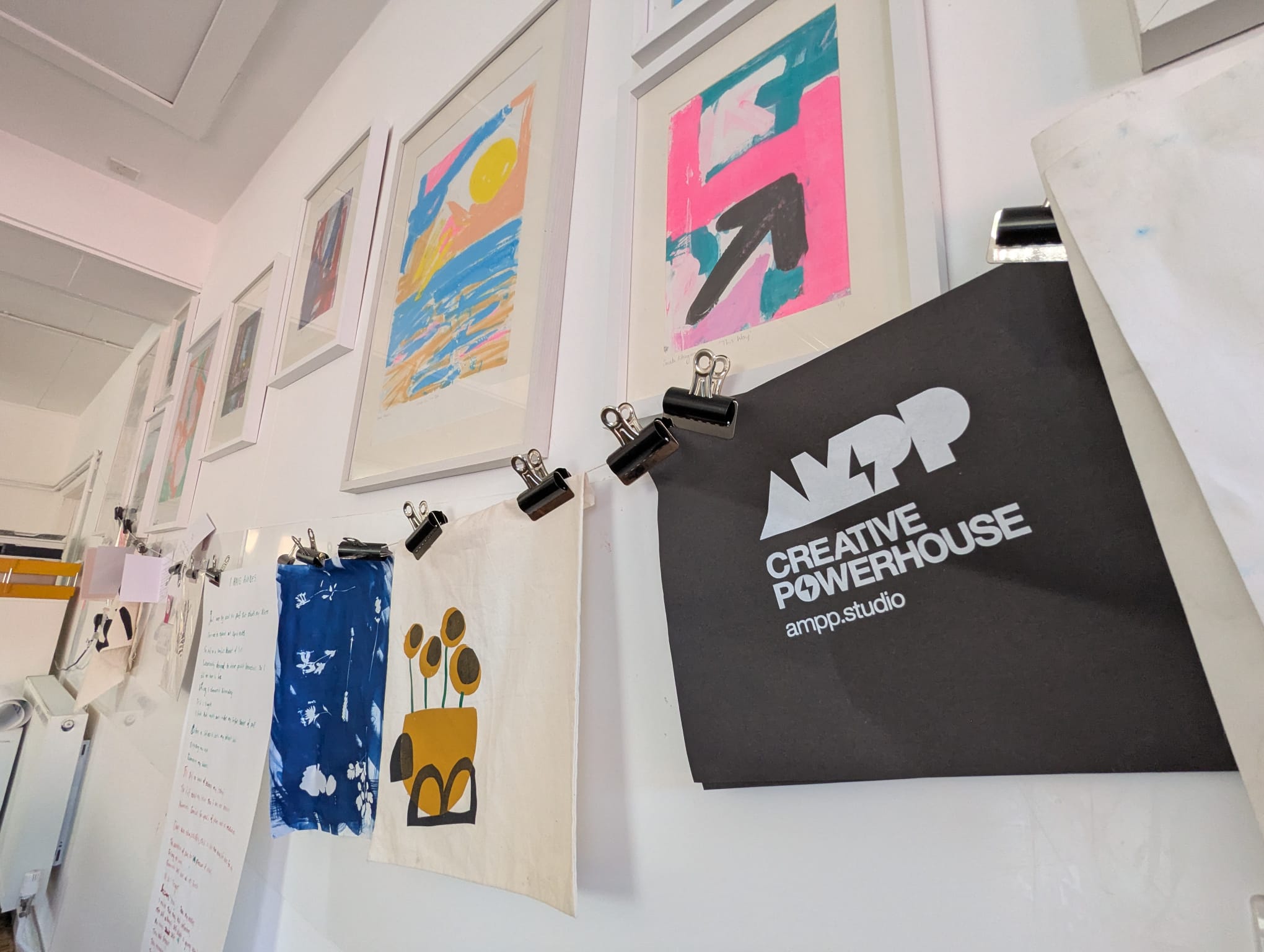 Art displayed on the walls of AMPP studio