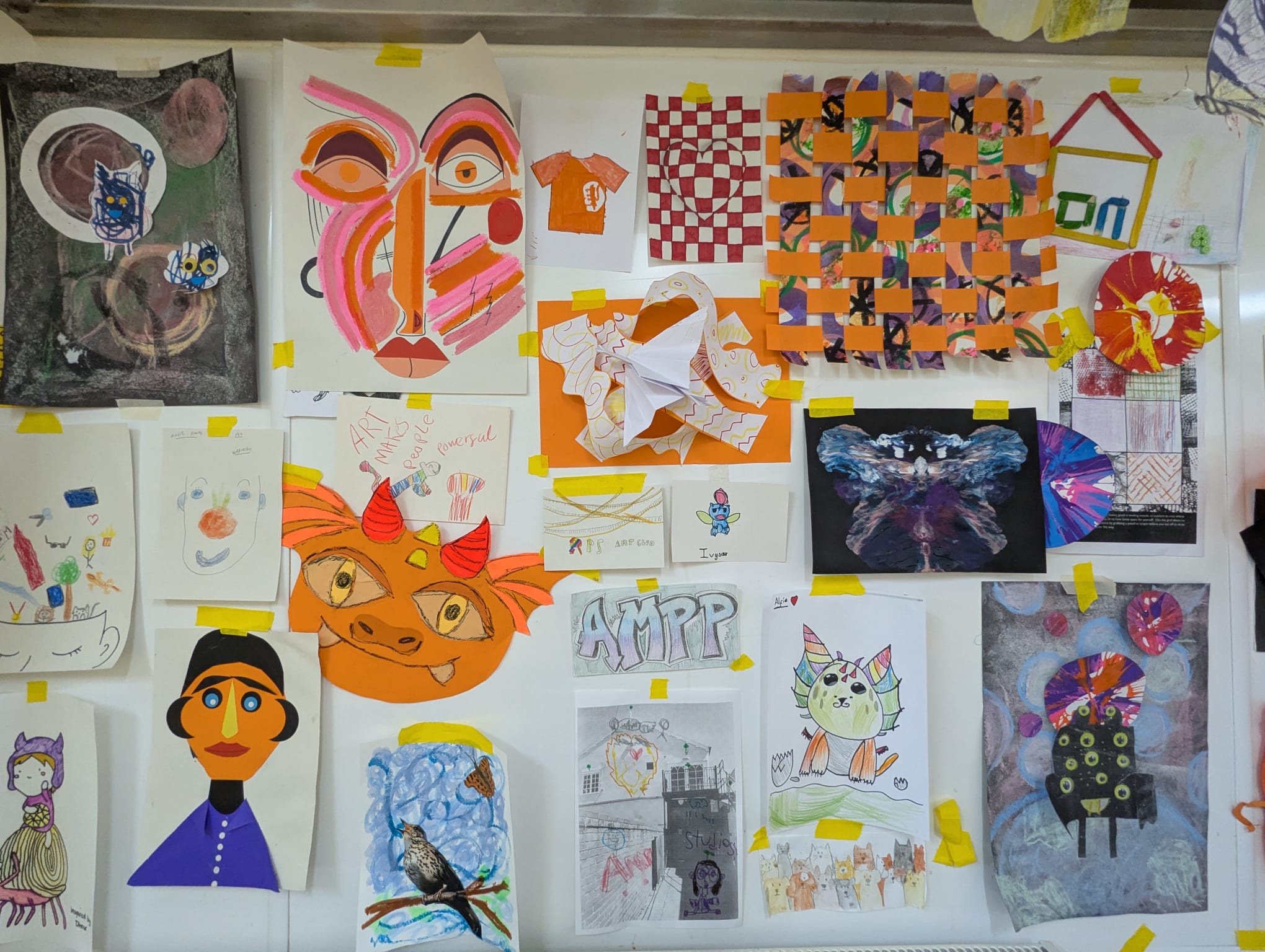 Art displayed on the walls of local art studio