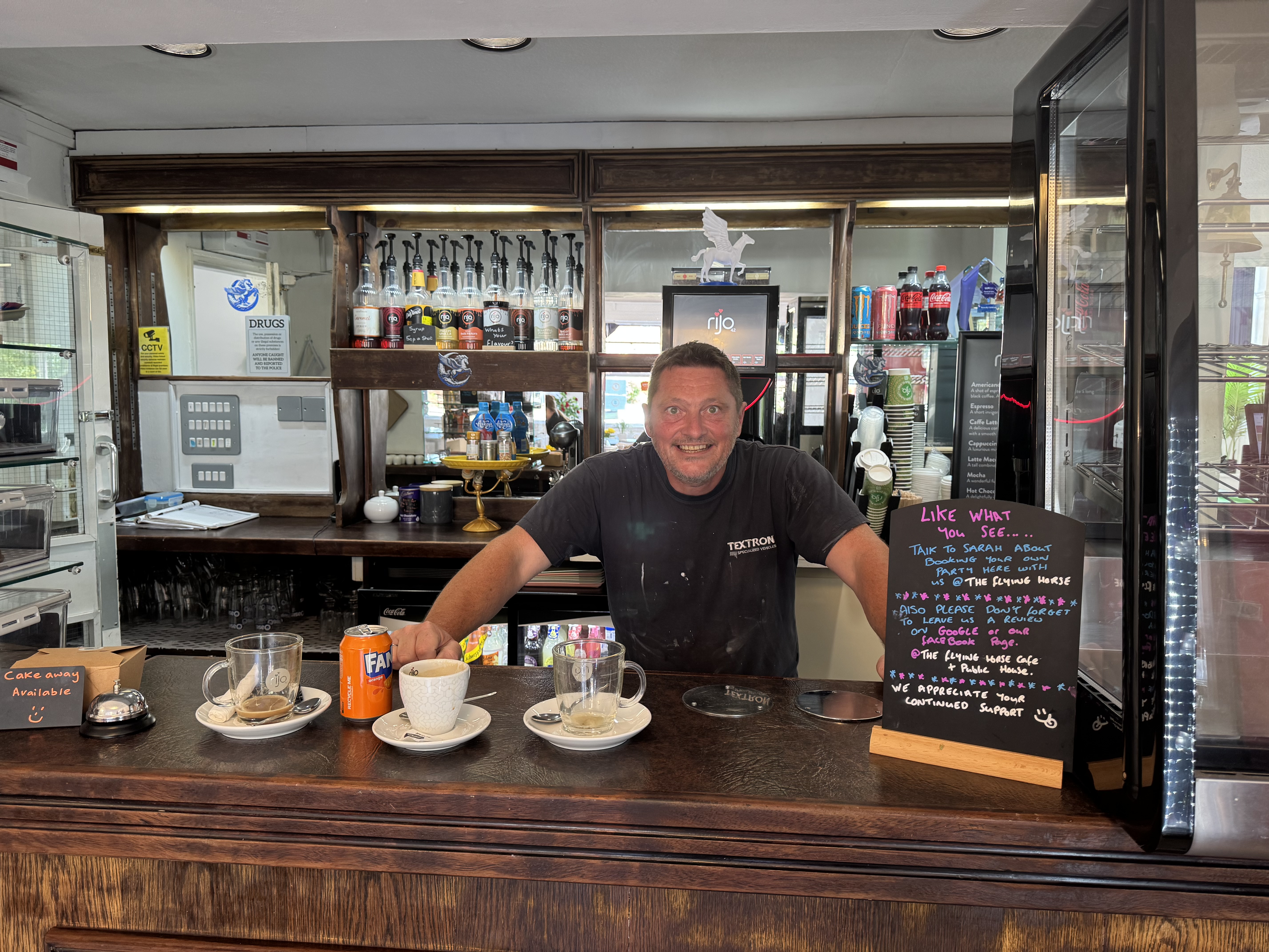 Guilio behind the cafe bar