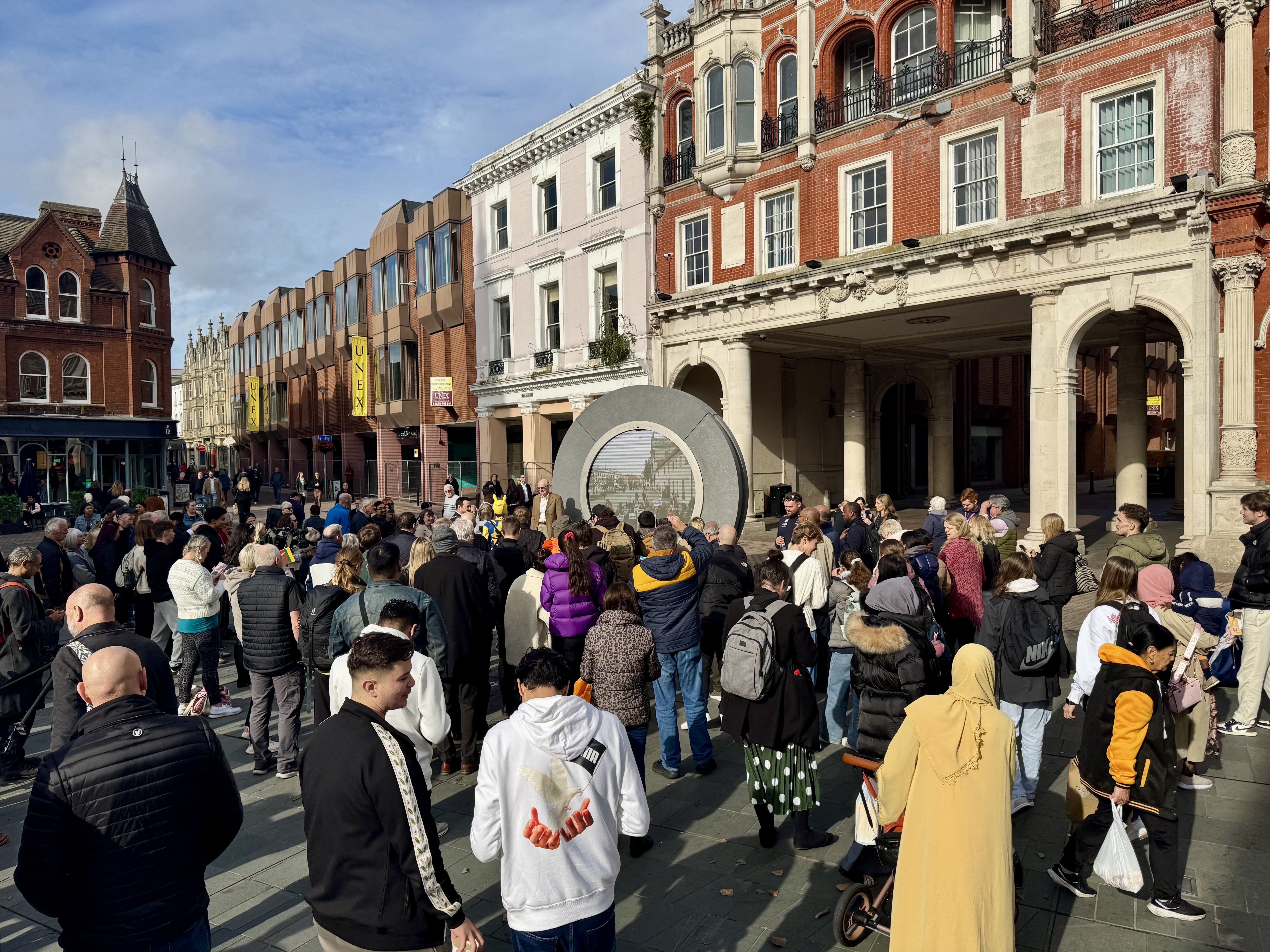 Residents gathering to view the Portal go live