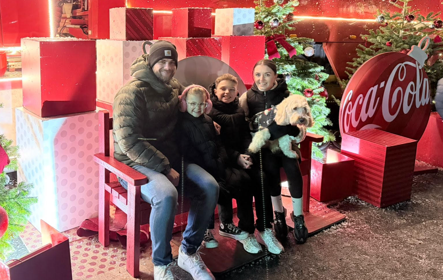 Faye with her partner and two children