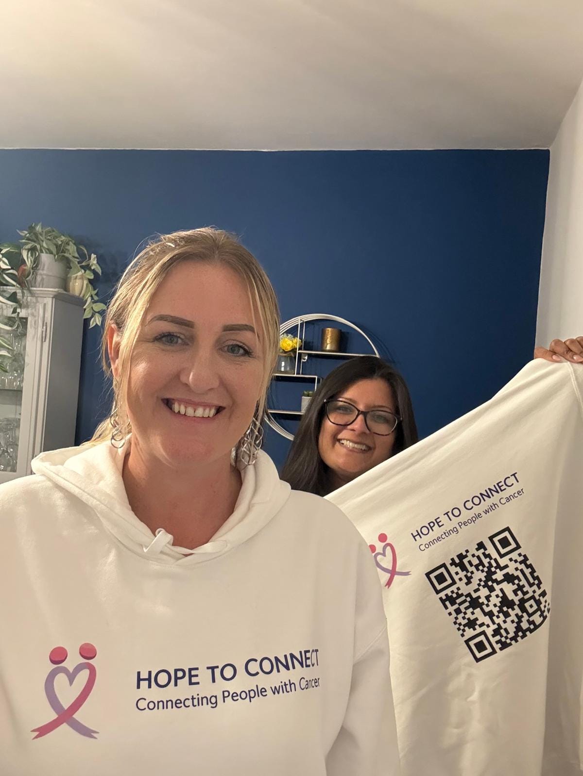 Emma and Mandeep with their Hope to Connect hoodies (Photo: Hope to Connect)