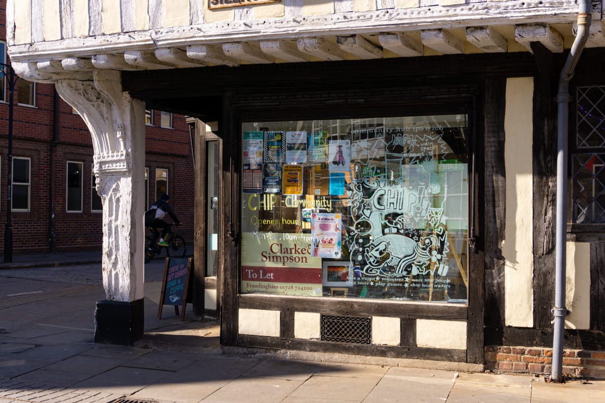 Building of where the chip is located with art at the front windows