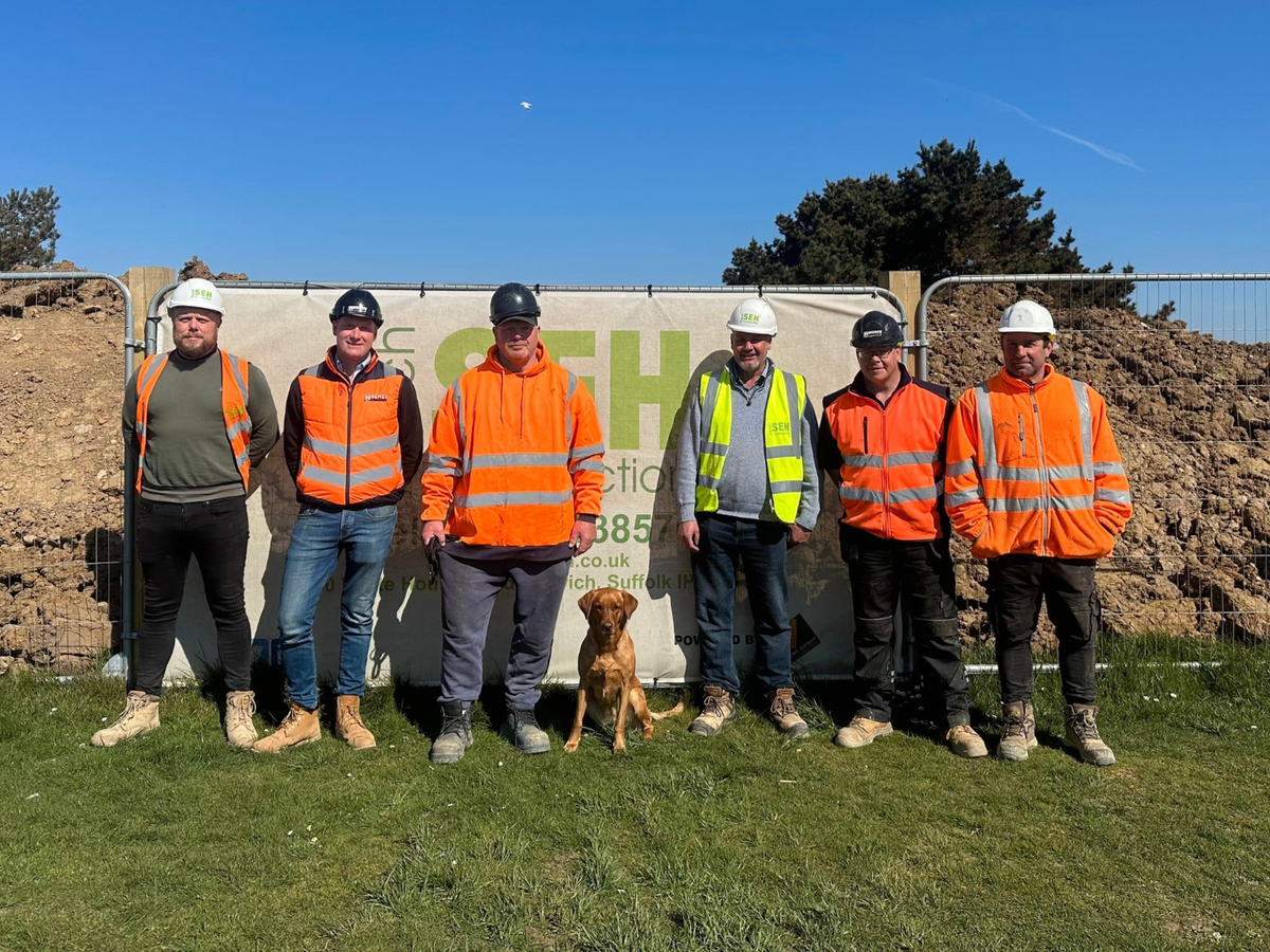 Merida with representatives from SEH French and Holmes Plant & Construction