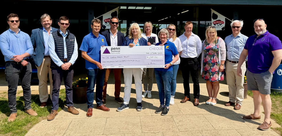 Penn Commercial presenting a cheque for £1,500 to The Suffolk Punch Trust