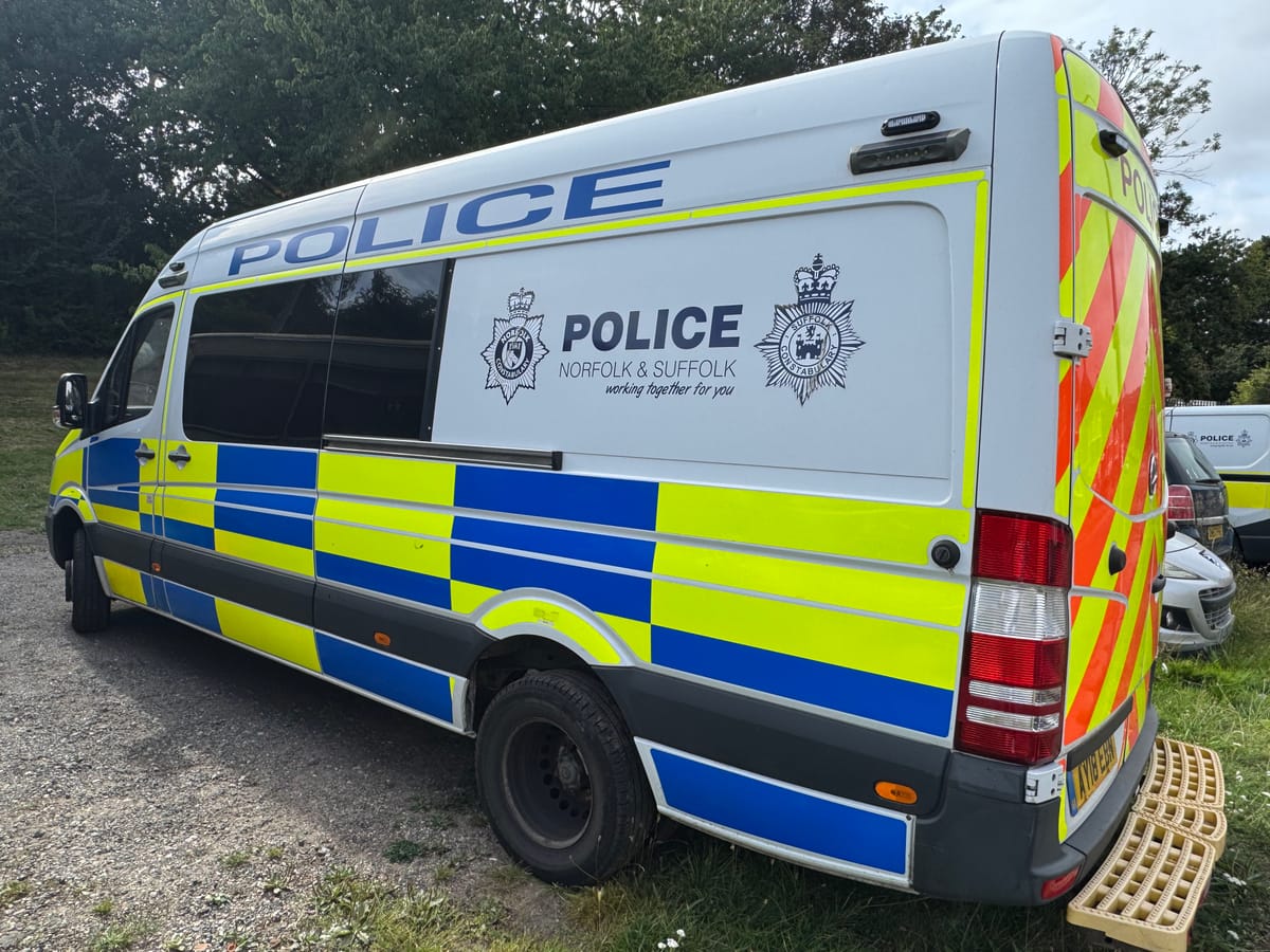 A police van parked at Broomhill Library in Ipswich