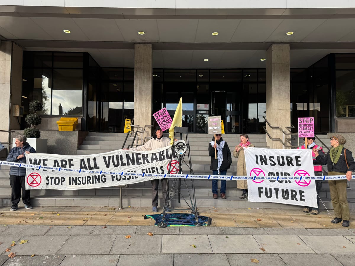 Extinction Rebellion activists outside AXA's offices on Civic Drive, Ipswich