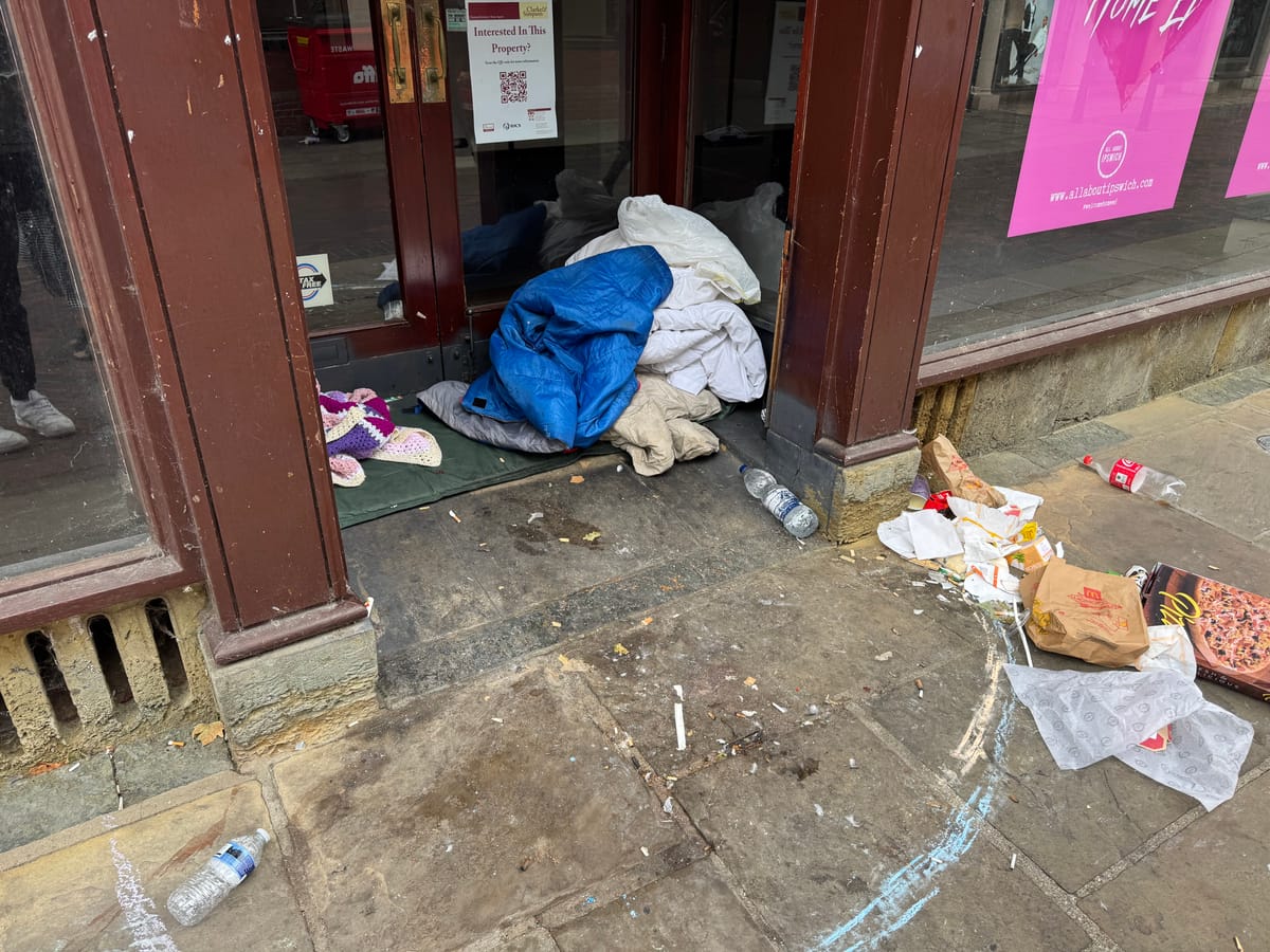 A homeless person has set up camp at the former Edinburgh Woollen Mill store on Butter Market