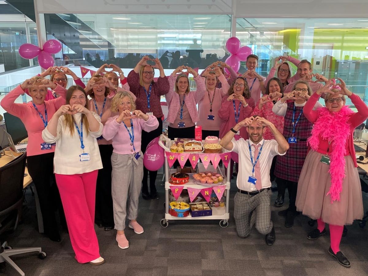 Julie's colleagues wearing it pink