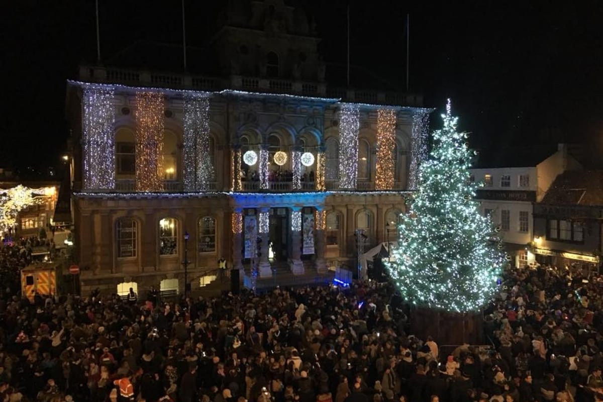 Christmas tree and crowd of people