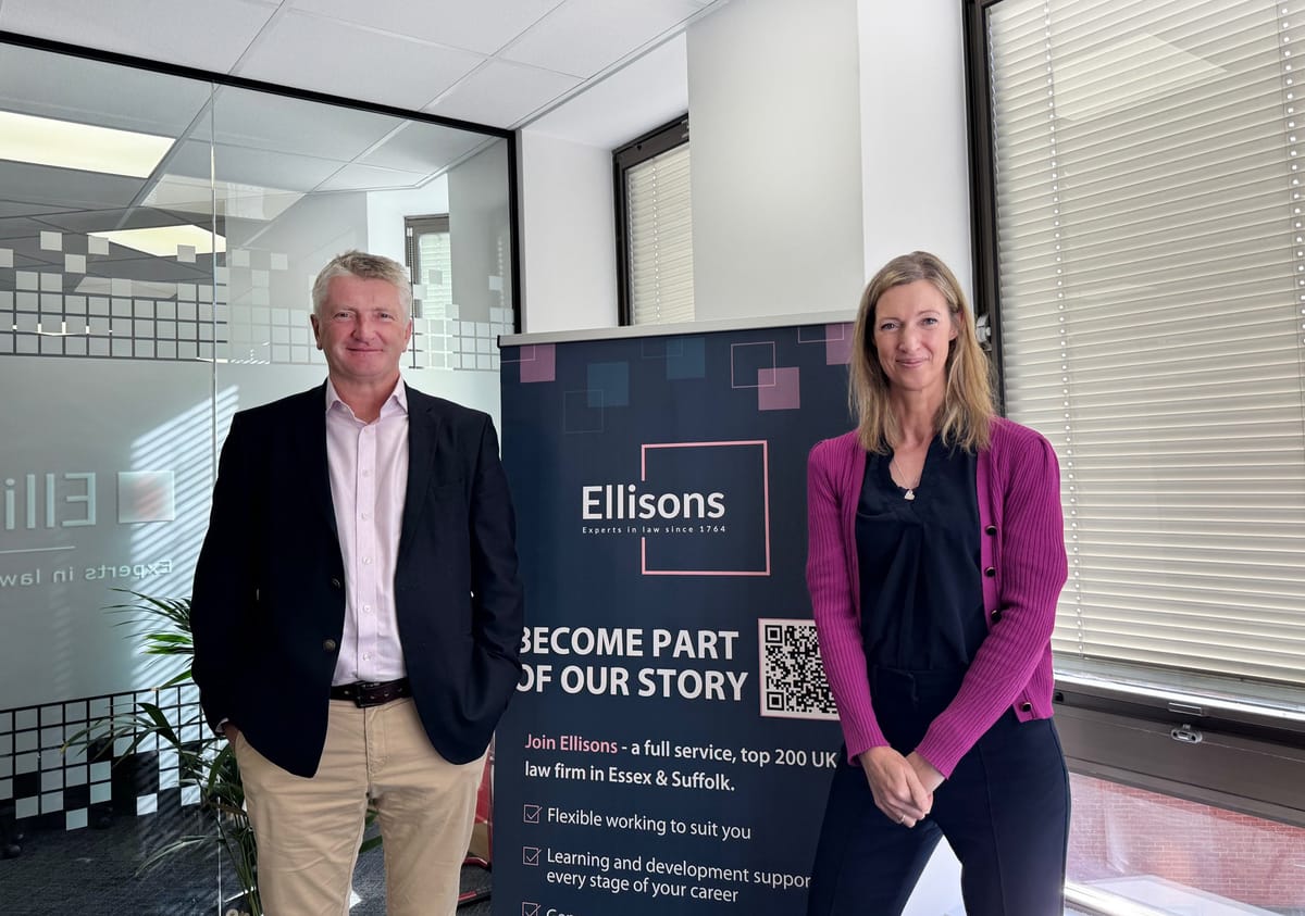 Two people in office room