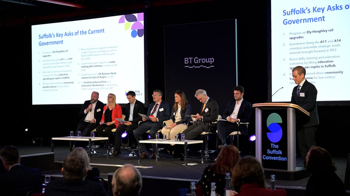 People sat on stage in a room