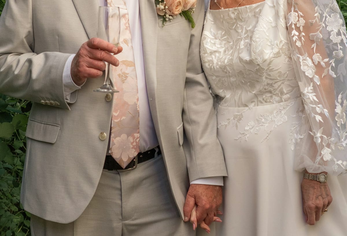 An elderly couple getting married