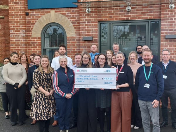 Ellisons team with a large cheque for £44,460