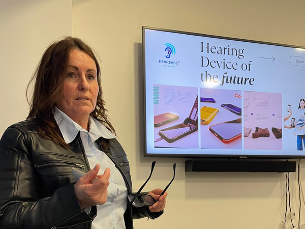 Michelle McDonagh presenting the Hearease device