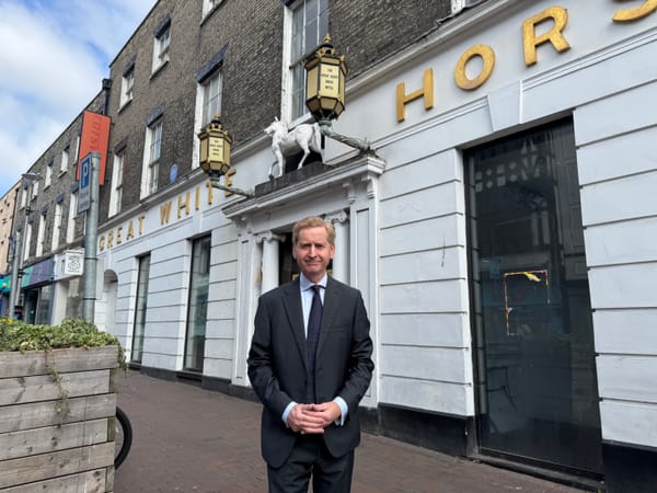 John Howard outside the Great White Horse Hotel in Ipswich