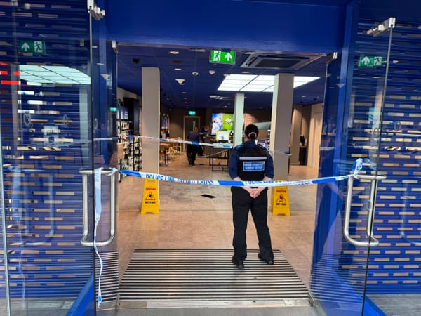 The O2 store on Tavern Street in Ipswich remains closed while police forensics officers carry out their investigation