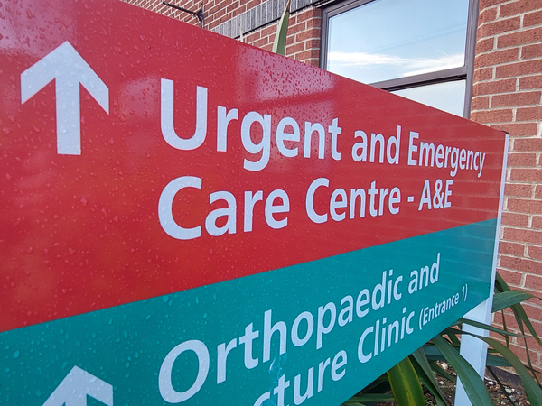 Urgent and emergency care centre and orthopaedic and fracture clinic sign at Ipswich Hospital