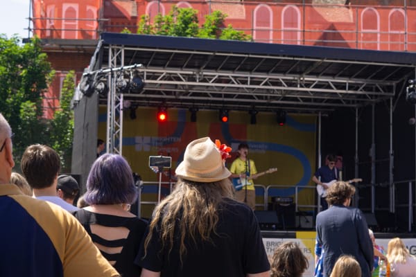 Crowds watching performers at the 2025 Brighten the Corners festival