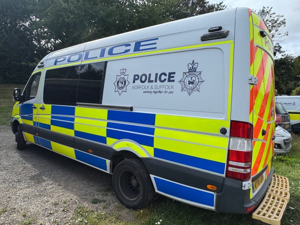 A police van parked at Broomhill Library in Ipswich