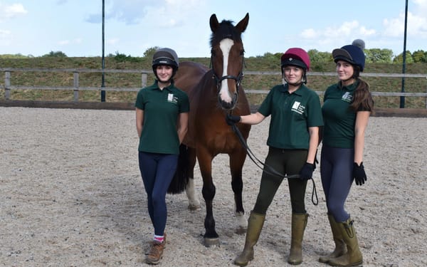 Chloe Milton, Olivia Fairs and India Yule with new horse Quinn at Suffolk Rural