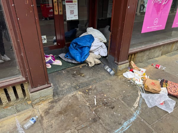 A homeless person has set up camp at the former Edinburgh Woollen Mill store on Butter Market