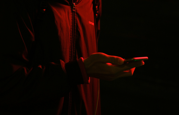 A young boy on his mobile