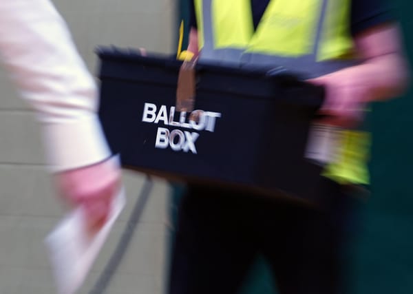 Ballot box being taken away