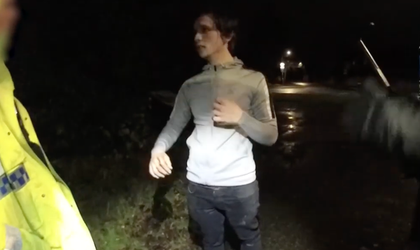 Elliott Mallett talking police officers on the night of the attack